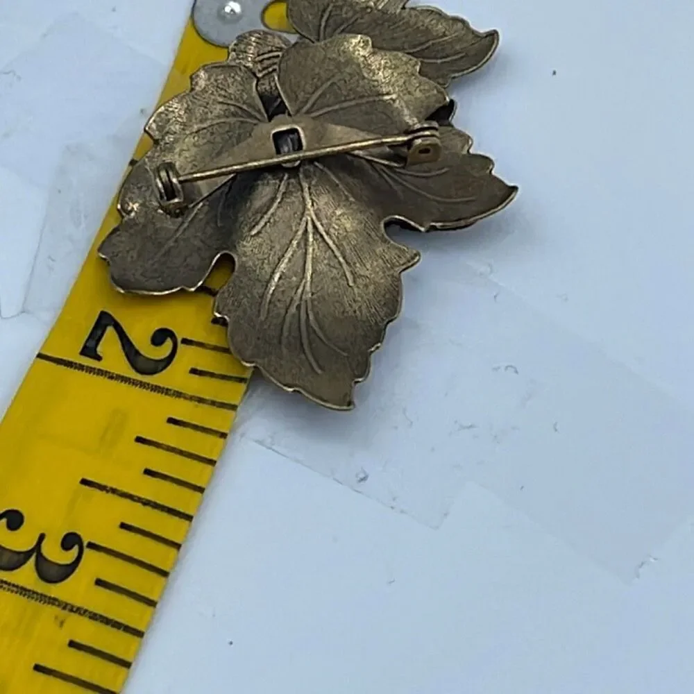 Vintage enameled layered leaf brooch.